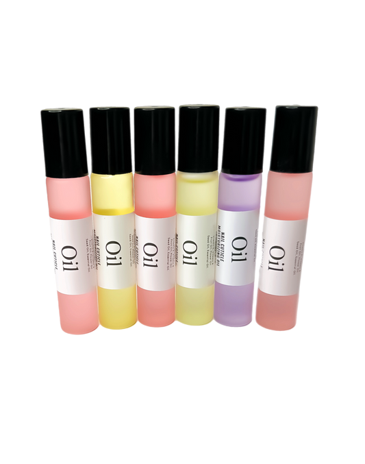 Picture displays Cuticle oil, brand L'AREA. Six transparent matte glass bottles with black plastic caps are  staying in a row.  White stickers on the bottle with the sign Oil, then Nail Cuticle moisturizing oil, then flavor as strawberry, pineapple, lavender etc. Oil have different color depends on the flavor. Pineapple and orange both yellow, apple, rose and strawberry contain oil pink color, lavender is purple color.