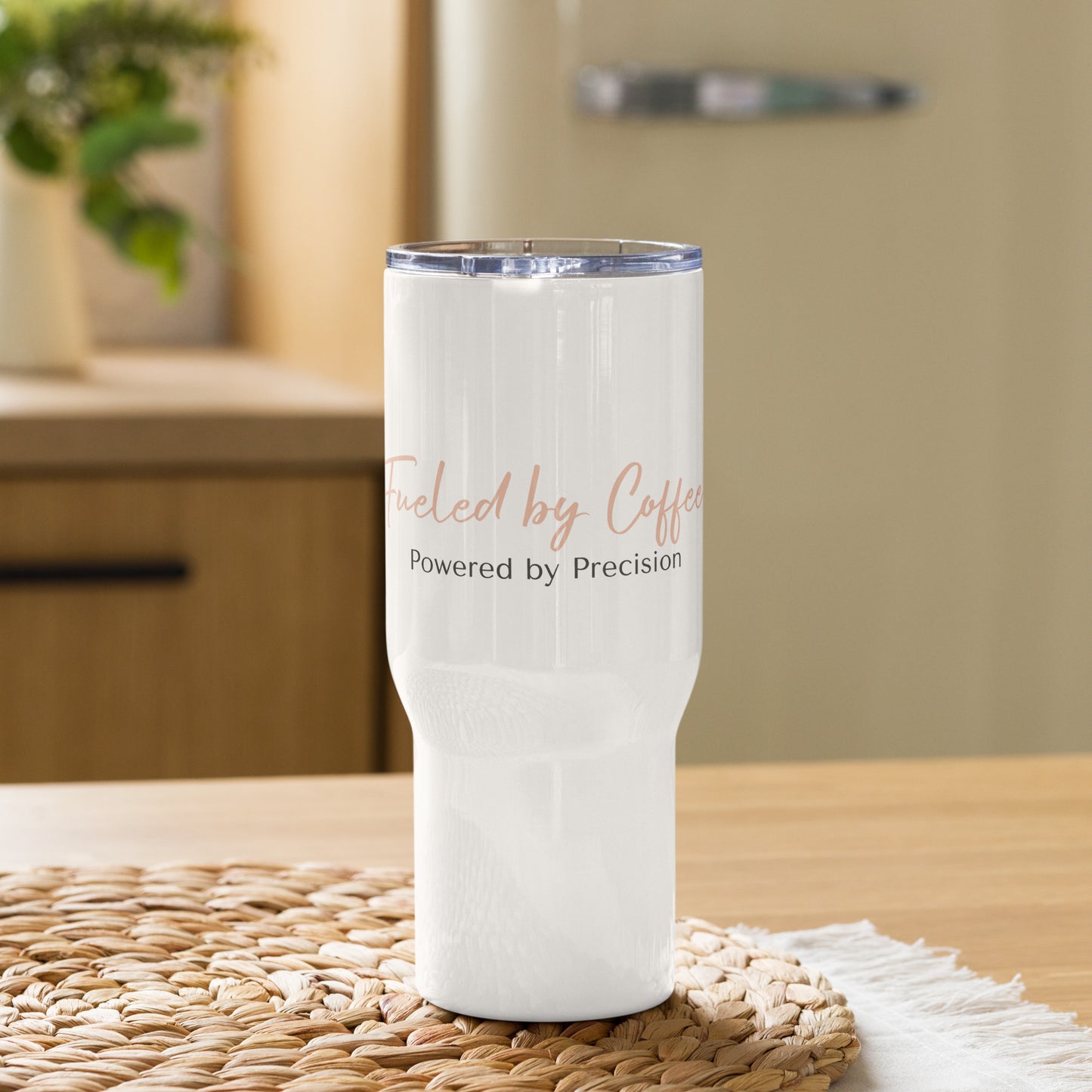 Travel mug with a handle with sign "Fueled with Coffee, Powered by Precision."